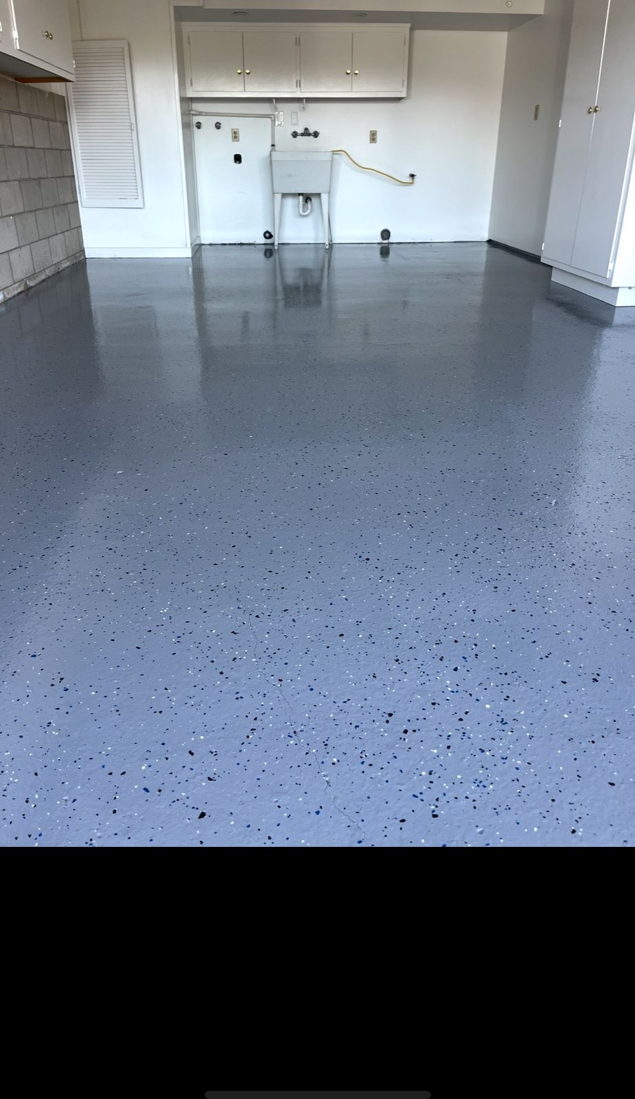 Gray speckled epoxy-coated garage floor in Buellton, CA